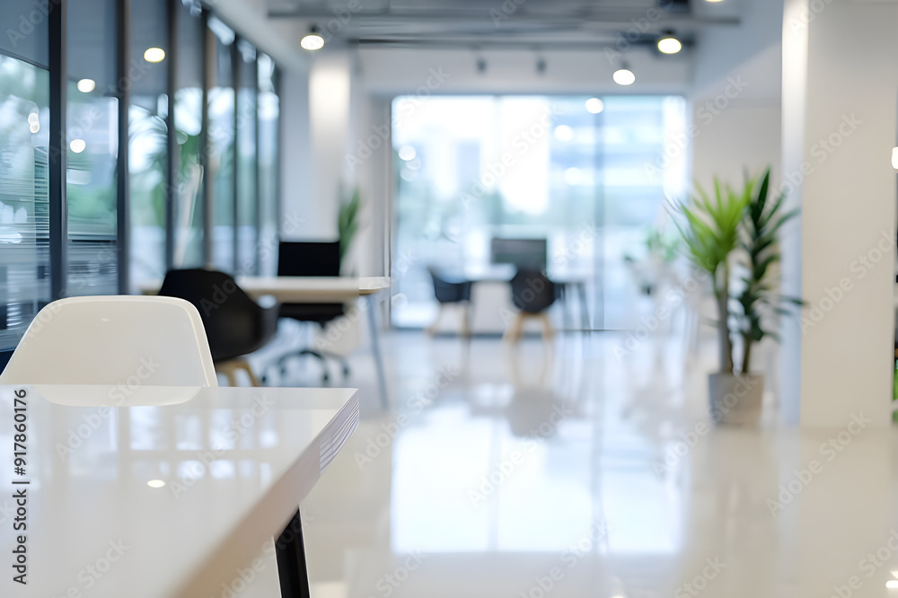 Bright and modern office interior with open workspace, featuring minimalistic design, glass walls, and indoor plants for a fresh atmosphere.