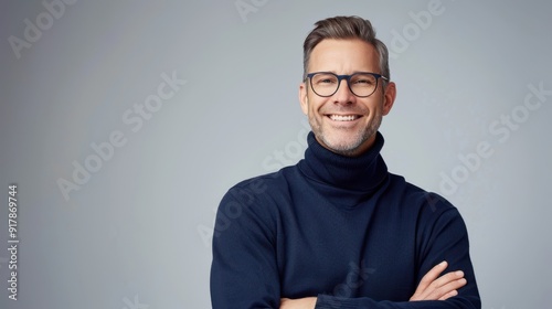 The smiling man in glasses