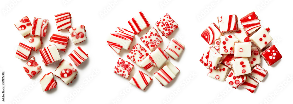Assorted peppermint fudge squares in festive red and white patterns for Christmas holiday treats on a white background Assorted peppermint fudge squares in festive red and white patterns for Christmas holiday treats on a white background