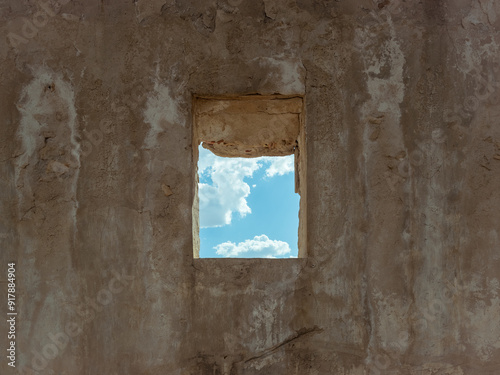 Window to the Past: Sky View through an Abandoned Structure photo