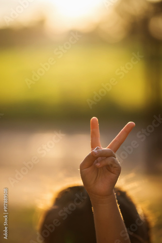 Image of child's hand as a symbol to keep fighting.
