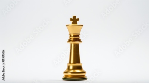 a solitary chess king, cast in gold,