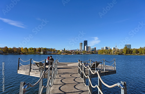 Photography People enjoy a sunny autumn day on the Danube river in Vienna