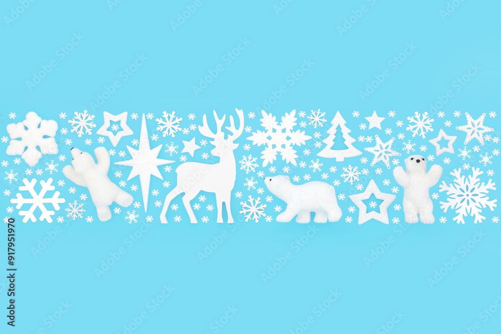 Obraz premium Christmas Eve North Pole fantasy design reindeer, polar bear, snowflake star pattern banner on blue. Frosted white decoration for Yule, Noel, Xmas season.