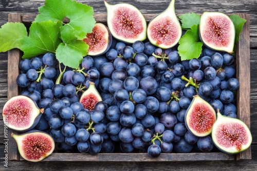 Fresh figs grapes on wooden table - fruit assortment display