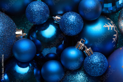 Obraz na płótnie Background with blue Christmas balls..Close-up of a pile of blue Christmas balls, different sizes, shades and textures. Flat lay w salonie