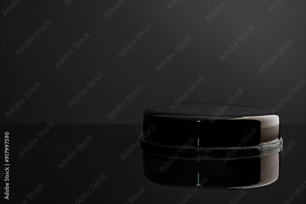 Banner with One black glossy cake with a mirror glaze on reflective black surface, topped with a line of small red berries. elegant and luxurious, for dessert marketing and restaurant menus