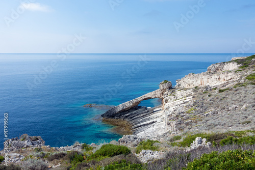 Amazing rocky formations and gorgeous sea waters of the south coastline in Othonoi island, Greece