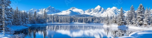 Wallpaper Mural Serene Mountain Majesty: Pristine Lake Reflecting Snow-Capped Peaks in Winter Wonderland. Inviting Tranquil Escape and Outdoor Adventure Amidst Nature's Grandeur. Perfect for Travel, Holiday Getaways, Torontodigital.ca