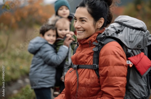 Family Enjoys Autumn Hike in Colorful Forest With Children Smiling and Laughing