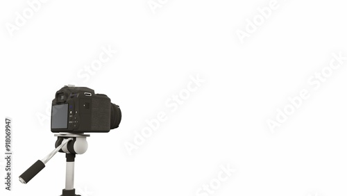 3D rendering of a camera on a tripod with a plain white background. Suitable to place on content with that theme.