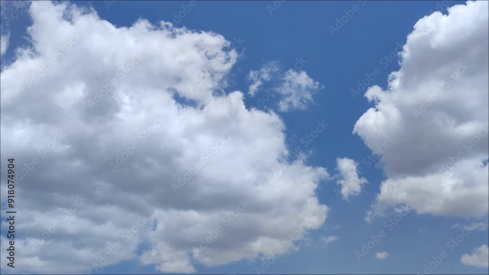 Bright sky at midday with curious clouds moving