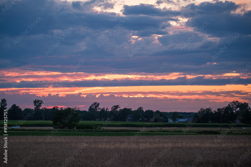 The sun setting on the Polish countryside. The sun setting. The sun setting on the Polish countryside. The sun setting.