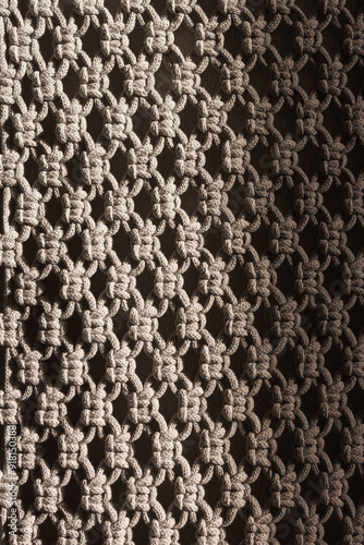 Detailed macrame texture close-up. Handmade macrame wall hanging craft design.
