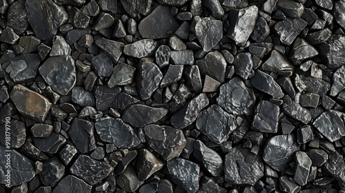 Black small road stone background, dark gravel pebbles stone texture seamless texture