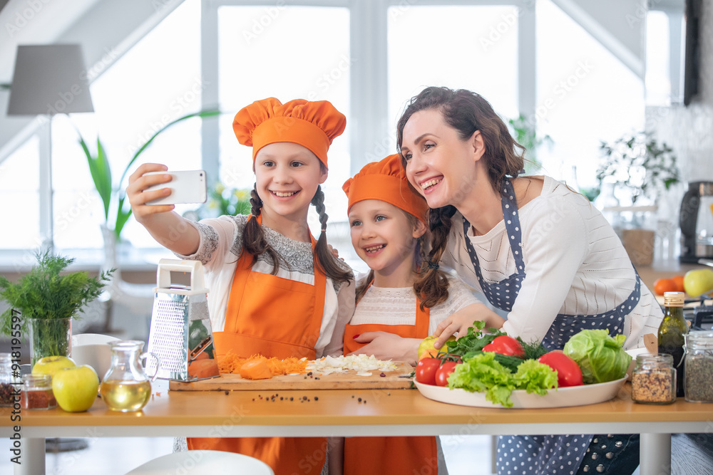 Family cooking in the kitchen at home