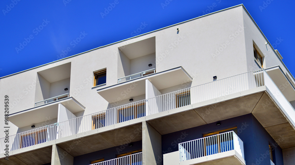 Fototapeta premium New apartment building. Residential area with modern apartment building.