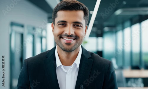 Confident insurance agent smiling in a modern office for business promotion