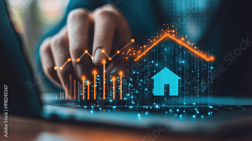 A businessman is touching a house icon with an arrow pointing up and graphs showing growth of real estate business concepts. Real estate and business growth in housing. Growth graph hologram
