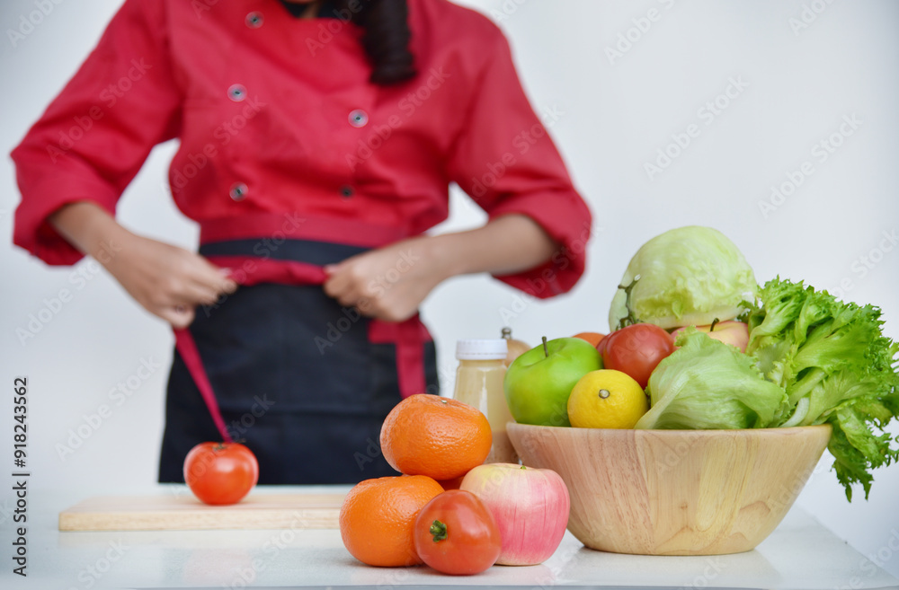 Close up Females Chef hands holding chop Wooden cutting board home kitchen. Women Chef hand cutting slice red tomato prepare fruit vegetables. Crop Woman hands use knife chopping organic tomato Close up Females Chef hands holding chop Wooden cutting board home kitchen. Women Chef hand cutting slice red tomato prepare fruit vegetables. Crop Woman hands use knife chopping organic tomato