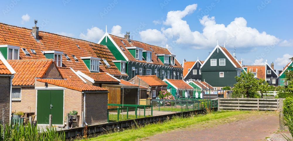 Panorama of green wooden houses in historic village Marken, Netherlands