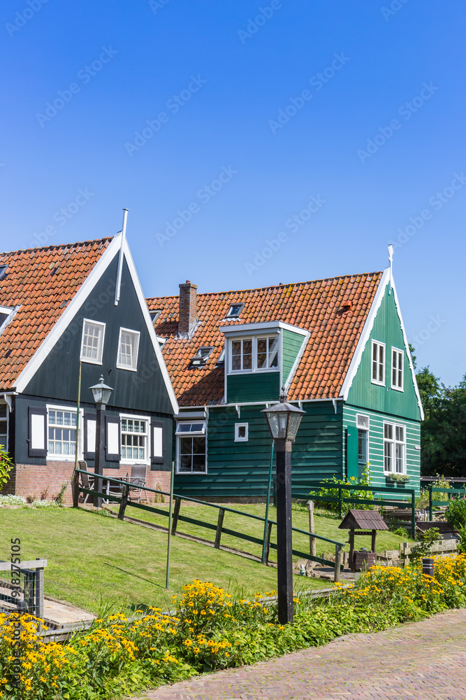 Traditional green wooden houses in historic village Marken, Netherlands