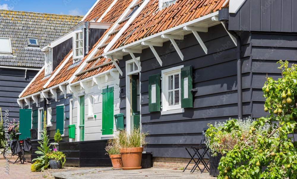 Front facades of traditional wooden houses in Marken, Netherlands