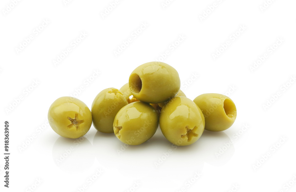 Natural green pitted olives isolated on white background close-up Natural green pitted olives isolated on white background close-up