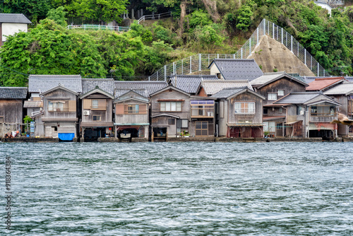 Beautiful scenic view with the wooden traditional waterfront boat houses called funaya around Ine Bay, in the village Ine, Japan