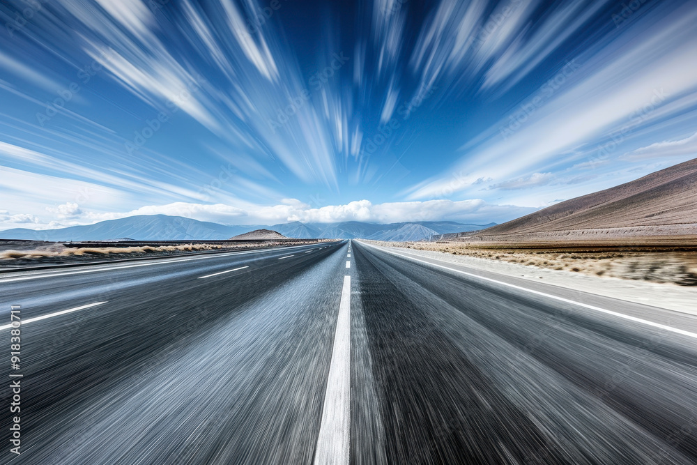 Highway with dynamic blur effect shows the sense of speed and movement on the open road. Highway with dynamic blur effect shows the sense of speed and movement on the open road.