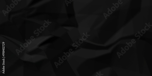 Background on a crumple paper wrinkled. crumpled pattern texture. dark black paper crumpled texture. Old vintage page dirty grunge vignette of old newspaper.