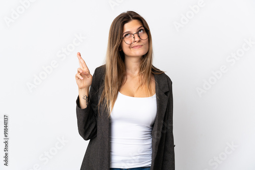 Business slovak woman isolated on white background with fingers crossing and wishing the best