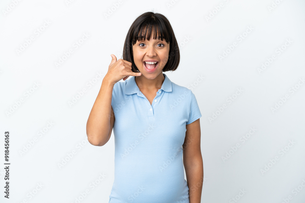 Pregnant woman over isolated white background making phone gesture. Call me back sign Pregnant woman over isolated white background making phone gesture. Call me back sign
