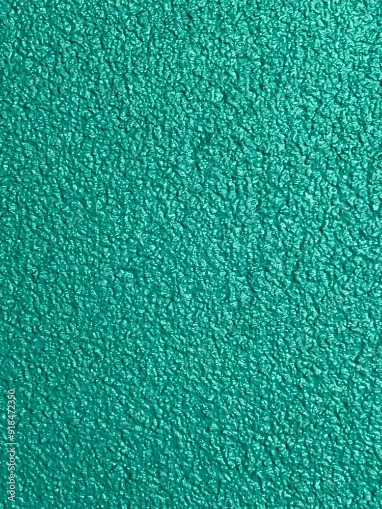Painted aqua green concrete textured background Painted aqua green concrete textured background