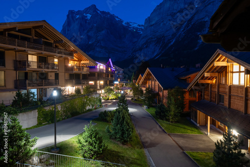 Cityscape nighttime view of a typical residential street in Grindewald Switzerland