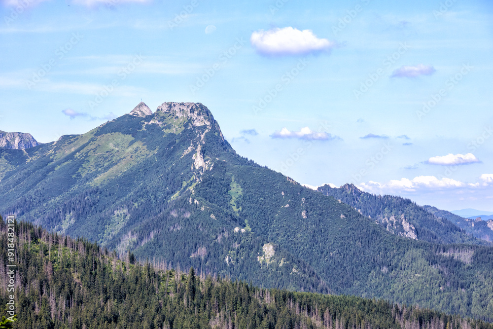 
Nature landscape in the mountains with some clouds in the sky