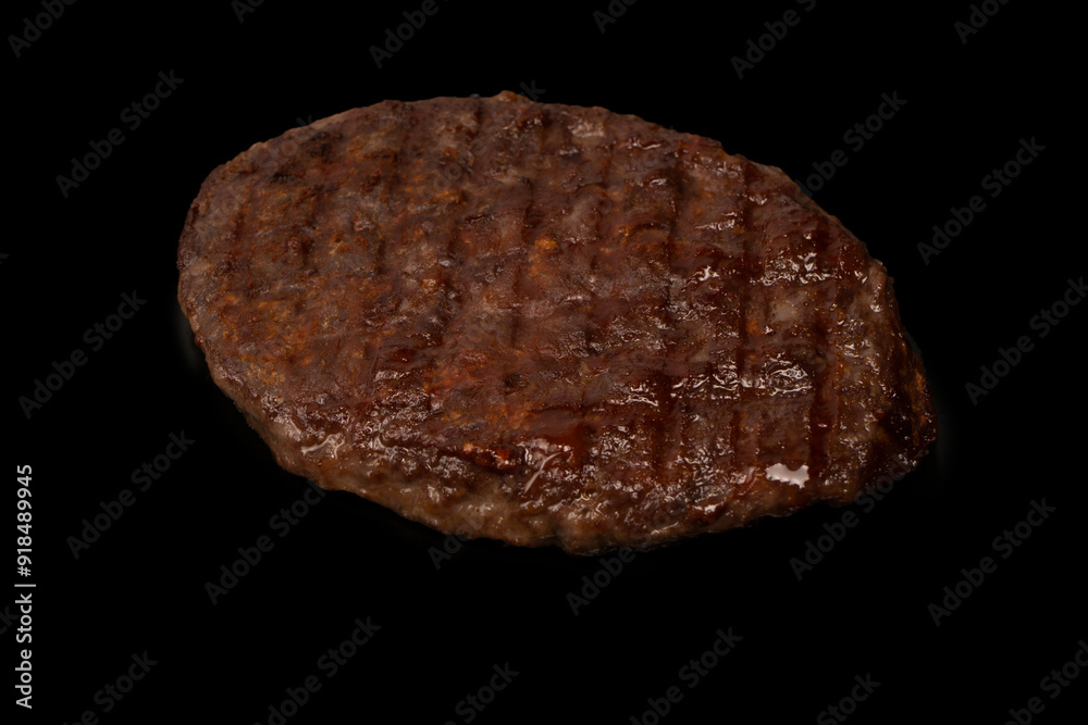 Cutlet with minced beef isolated on black background. Cutlet with minced beef isolated on black background.