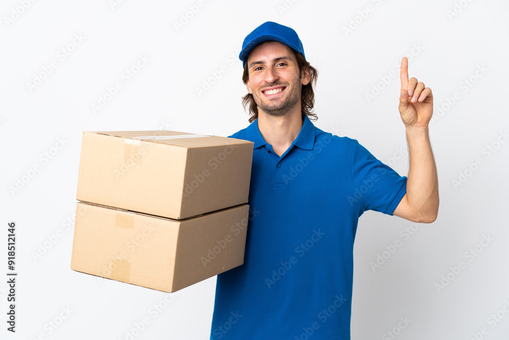 Delivery man isolated on white background pointing up a great idea Delivery man isolated on white background pointing up a great idea