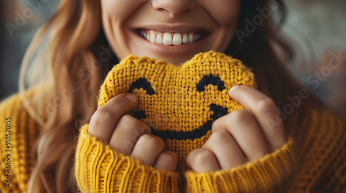 Woman Holding Smiley Face Crochet
