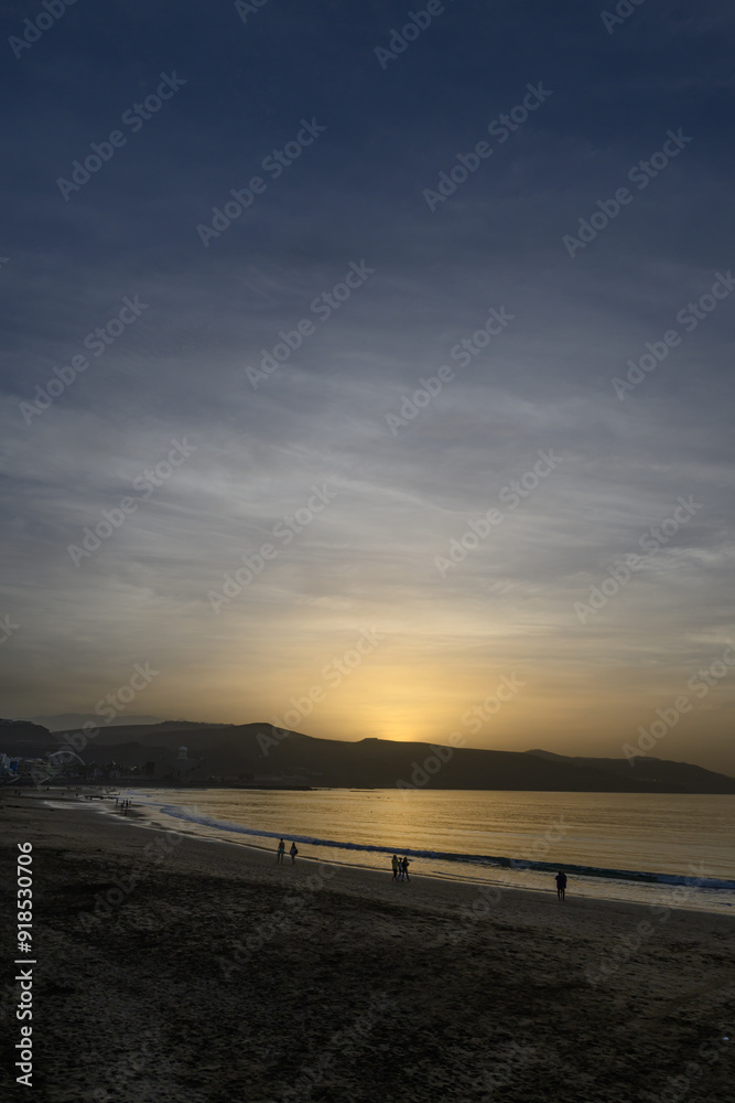 Sunset over the horizon with calm beach Sunset over the horizon with calm beach