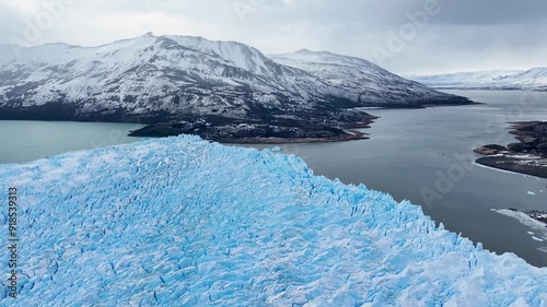 Perito Moreno Glacier At El Calafate Santa Cruz Argentina. Aerial View Of Massive Glacier Calves Into A Lagoon Of Icy Water. Outdoor Travel Destinations Patagonia Glacier. photo