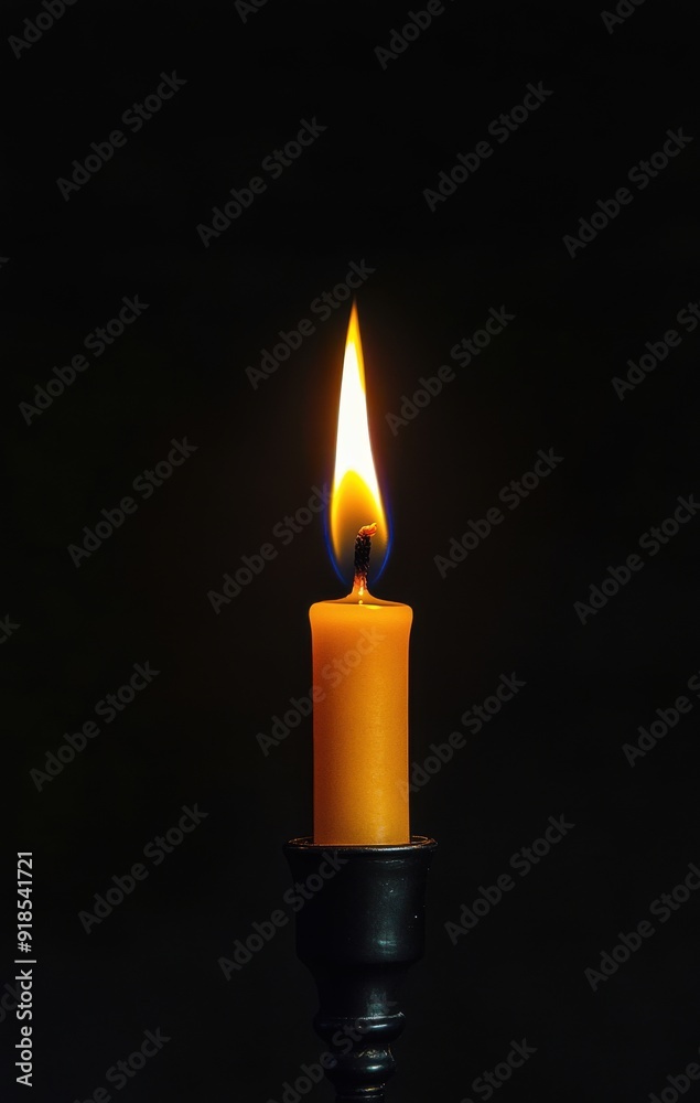 single candle flame glowing brightly against the darkness, symbolizing hope and nighttime single candle flame glowing brightly against the darkness, symbolizing hope and nighttime