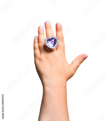 Child's show hand with a jewelry ring with a large gemstone.