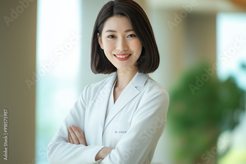 High-quality portrait headshot of an Asian Chinese medical doctor, emphasizing their professionalism and expertise in the healthcare industry. Ideal for medical profiles, healthcare websites, branding