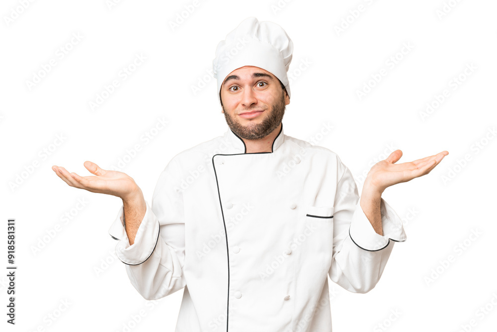 Young handsome chef man over isolated background having doubts while raising hands Young handsome chef man over isolated background having doubts while raising hands