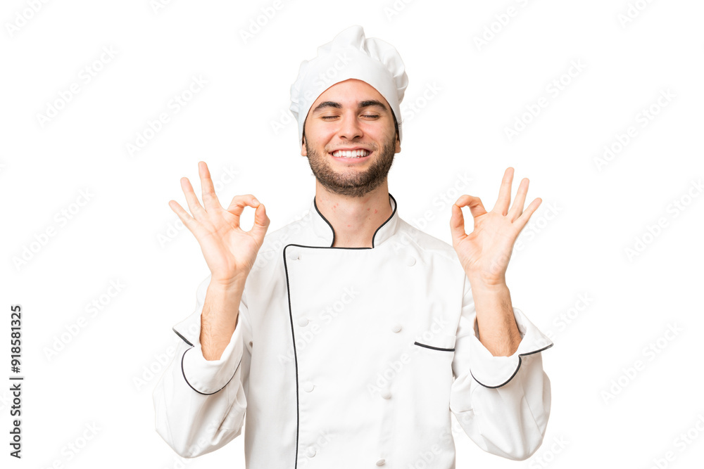 Young handsome chef man over isolated background in zen pose Young handsome chef man over isolated background in zen pose