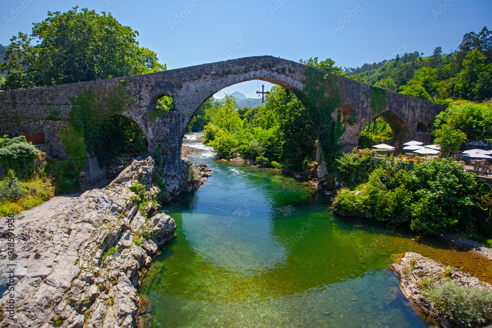 Beautiful mountain river and ancient bridge in Olla de San Vicente , Spain Beautiful mountain river and ancient bridge in Olla de San Vicente , Spain