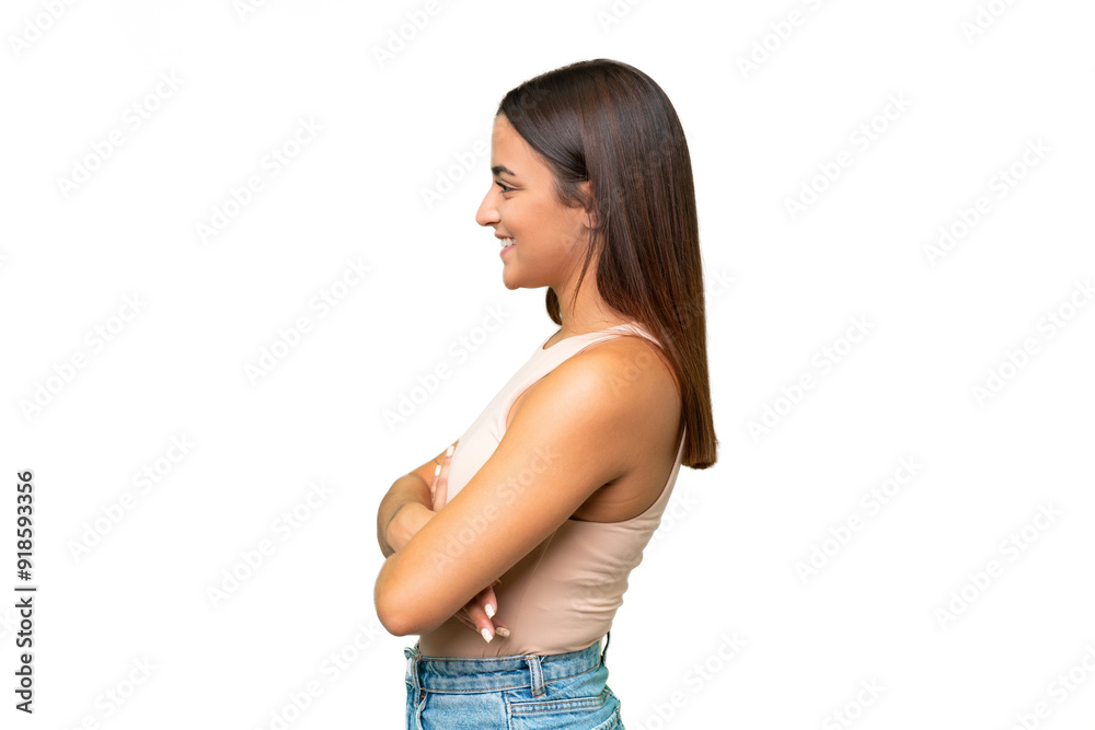 Young caucasian woman isolated on green chroma background in lateral position Young caucasian woman isolated on green chroma background in lateral position