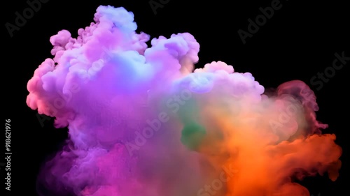 Colorful smoke clouds swirling in the air during a nighttime display