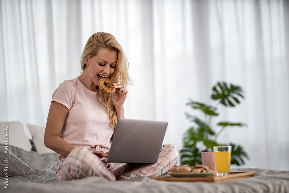 Fototapeta premium Woman Shopping Online from Bedroom